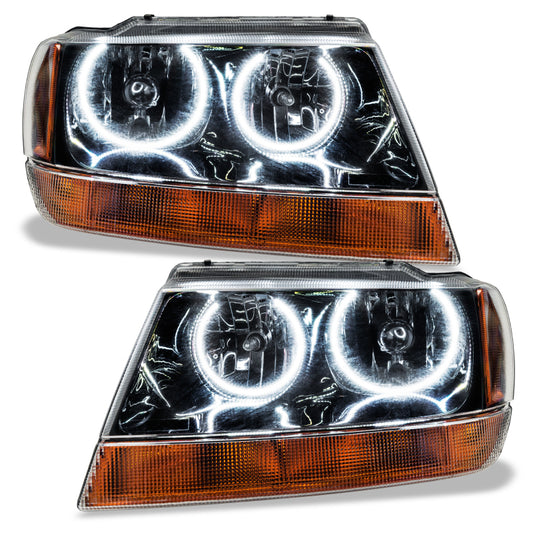 Oracle Lighting Jeep Grand Cherokee 99-04 black and white SMD headlight showing the sleek design and LED accents.