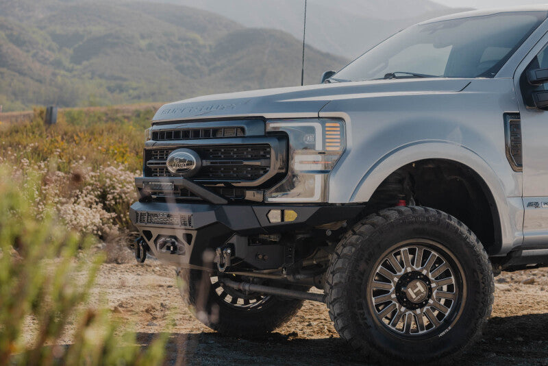 DV8 Offroad steel front bumper for 2017-2022 Ford Super Duty F-250 and F-350 trucks, featuring rugged design and heavy-duty construction.