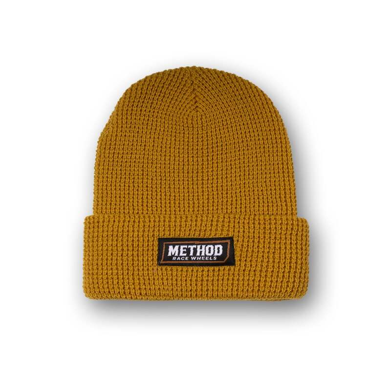Method Wheels Electric Block Beanie in camel color, stylish one-size knit hat with bold electric block design, perfect for casual wear.