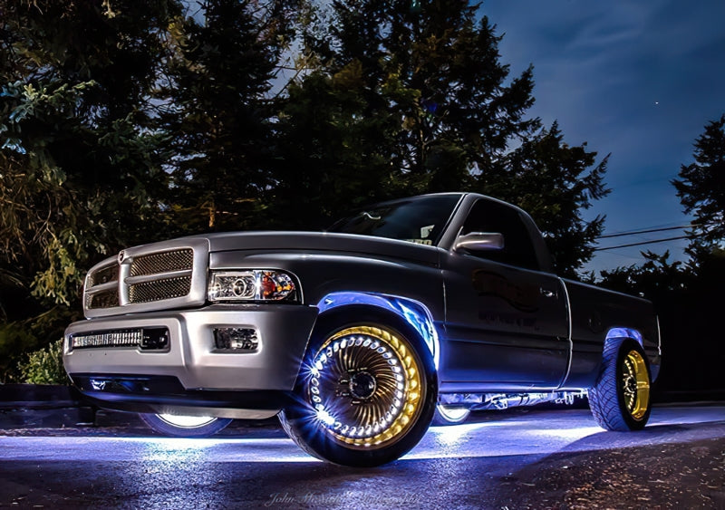 Oracle LED Illuminated Wheel Rings, ColorSHIFT light strip LED showing vibrant, multicolor illumination on a vehicle wheel.