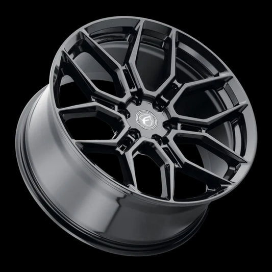 Forgestar X12 22x10 cast wheel in gloss black, featuring 6x135 bolt pattern, ET30 offset, and 6.68-inch backspacing.
