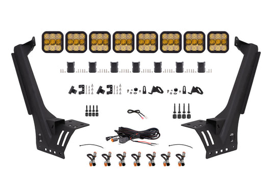 Diode Dynamics Jeep JL SS5 Sport CrossLink yellow combo lightbar kit mounted on windshield with LED light bars and cubes.
