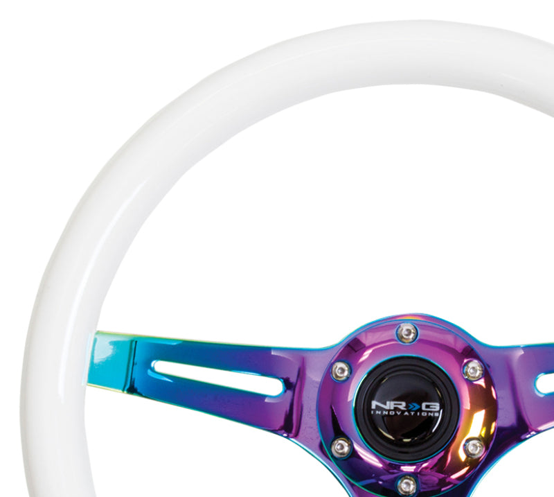NRG Classic wood grain steering wheel with green glow-in-the-dark grip and neochrome 3-spoke center, 350mm diameter.