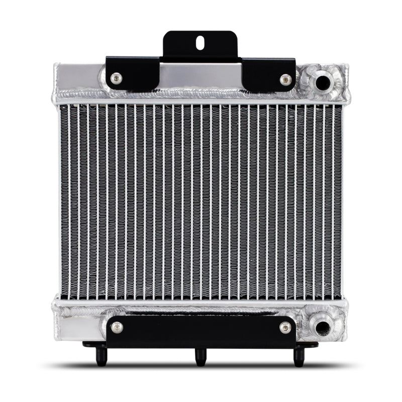 Mishimoto performance auxiliary radiator for BMW F8X M3 M4 models, showing the sleek aluminum core and fitting connections.