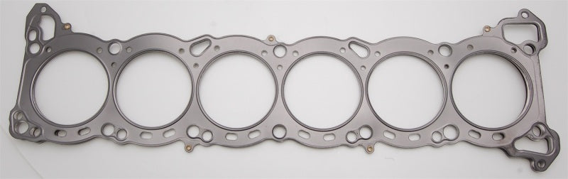 Cometic Nissan RB-25 6-cylinder MLS head gasket with 86mm bore and .051 inch thickness, showing gasket surface and sealing edges.