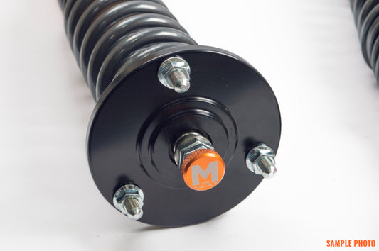 Moton MK7/MK8 VW Golf GTI/R coilovers with adjustable shocks and springs, shown installed on a car.