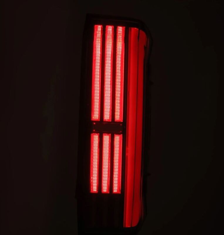 AlphaRex Nova-Series LED tail lights for Toyota Tundra 22-24, black and red prismatic design, showcasing sleek automotive lighting.