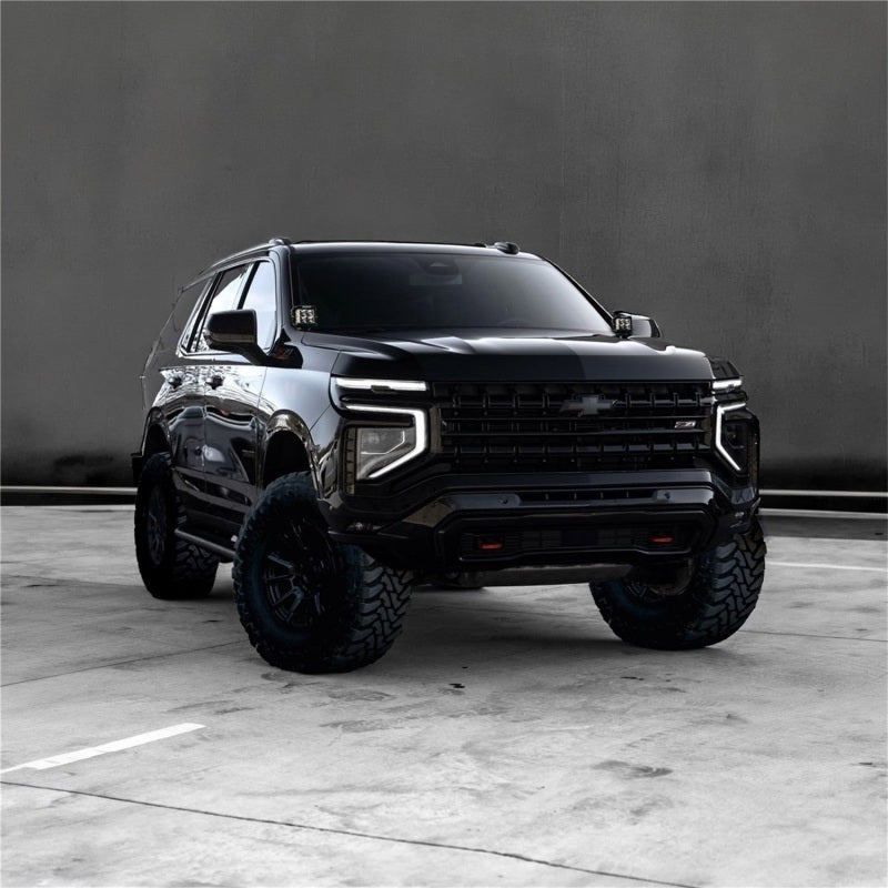 Rigid Industries D-XL light bar kit for GMC Yukon and Chevrolet Tahoe/Suburban, includes LED light bars and cubes.