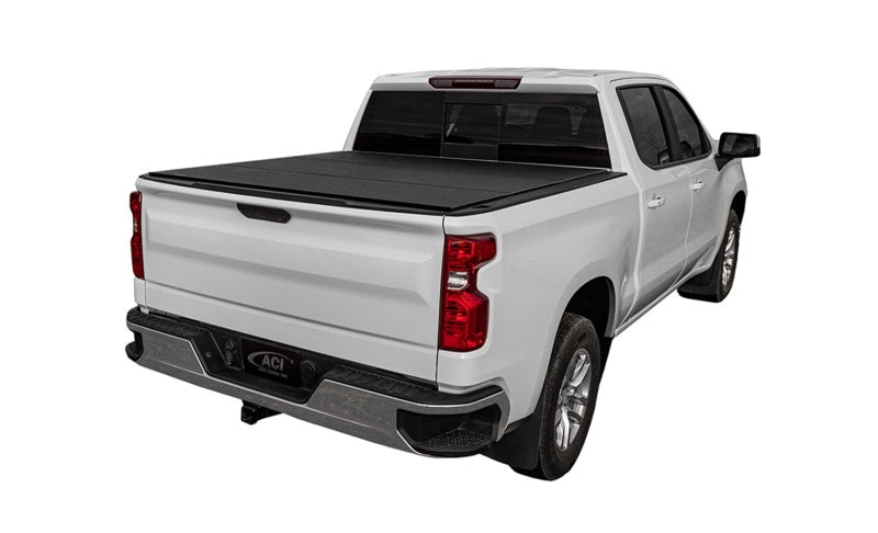 Access LOMAX black tri-fold truck bed cover on Chevrolet Silverado 1500 with 6ft 6in bed, urethane finish, exterior truck bed accessory.