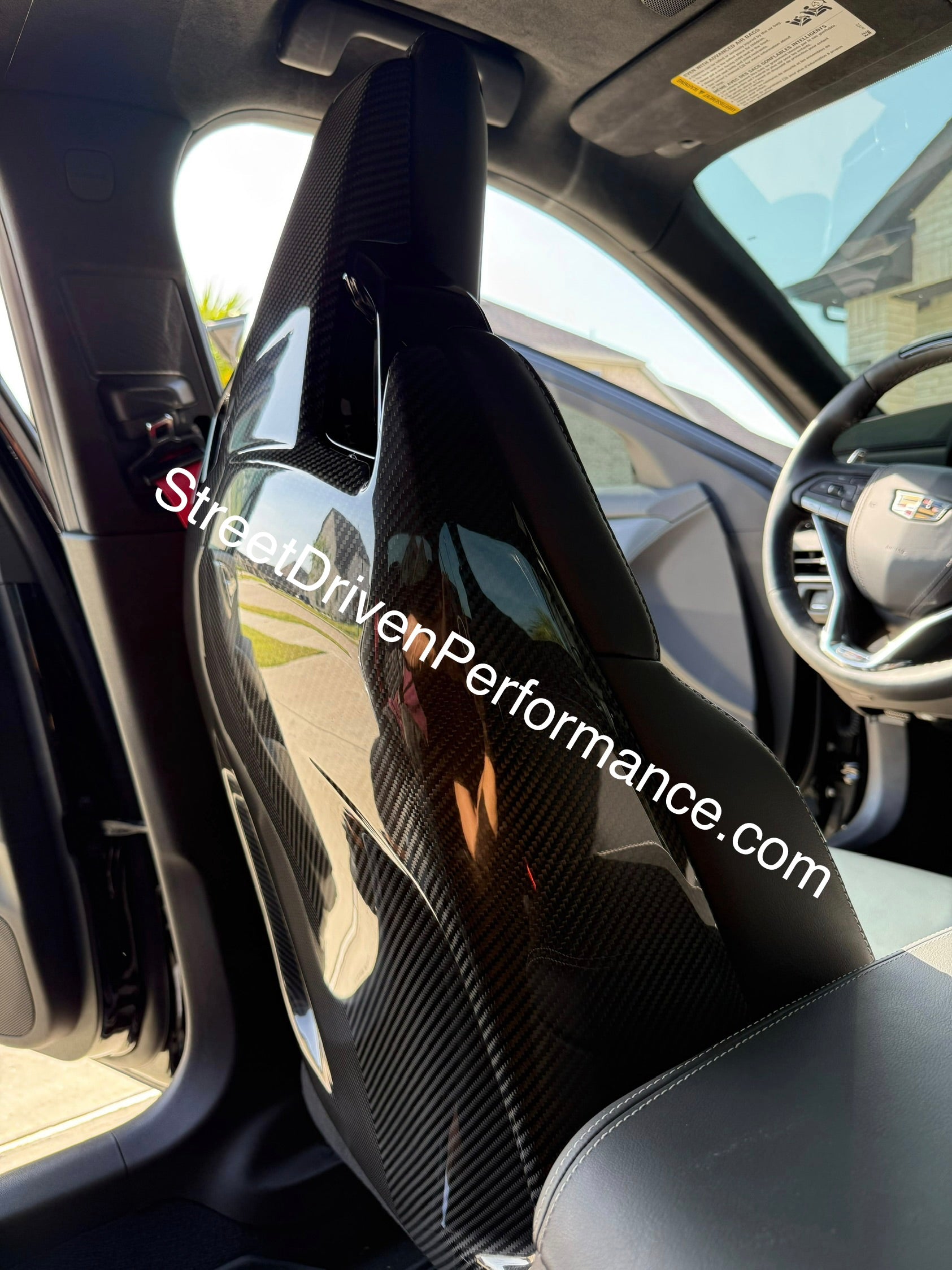 Pair of black carbon fiber seat back panel replacements for Cadillac CT5-V and Blackwing interior dash trim, driver and passenger side.