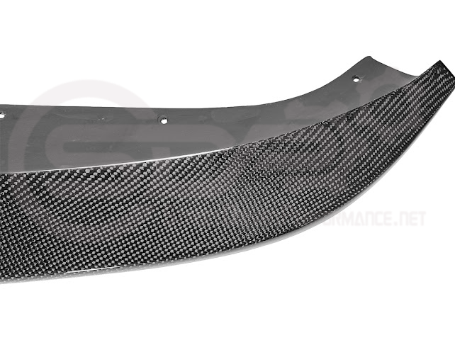 Black carbon fiber front bumper lip splitter for Cadillac CT5 Sport and V models, designed for a sleek, sporty ground effect look.