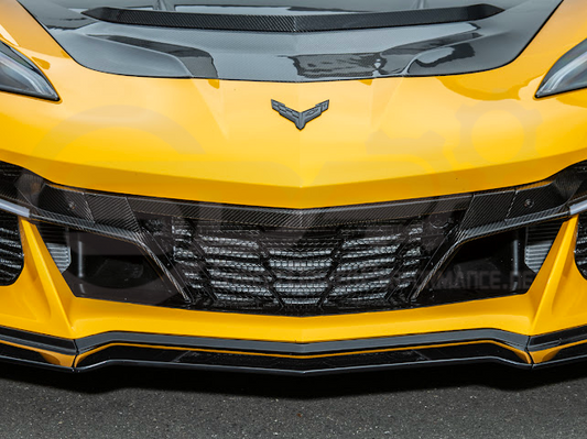 Corvette C8 Z06 factory-style carbon fiber front grille license holder and tow trim designed for 2023-up Corvette C8 Z06 exterior upgrade