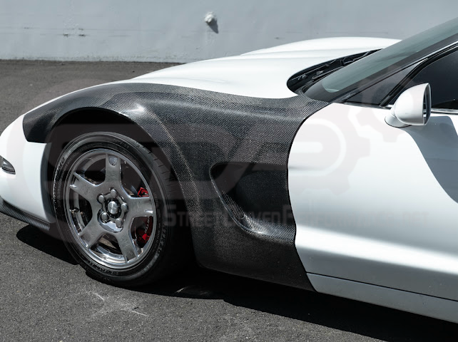 Factory style carbon fiber front and rear widebody fenders for 1997-2004 Chevrolet Corvette C5 hatchback by Street Driven Performance.