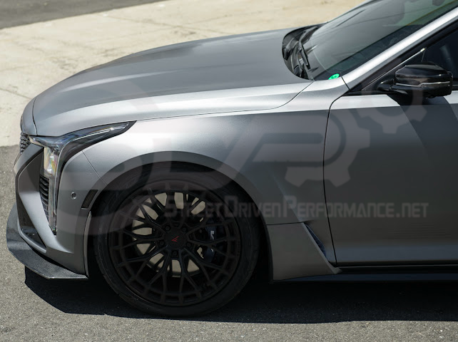 Cadillac CT5-V Blackwing factory OEM style carbon fiber front lip splitter and wheel arches for ground effects and sporty look.