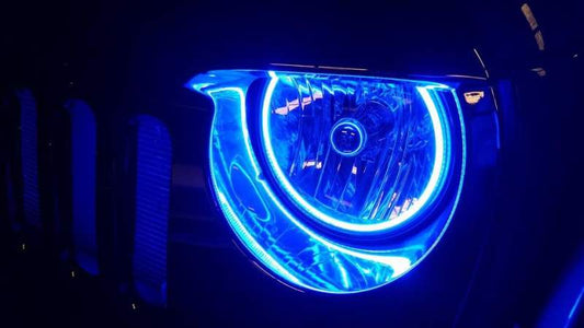 Oracle Lighting LED waterproof fog light halo kit with colorSHIFT for Jeep Wrangler JK 2007-2017, showing illuminated halo rings.