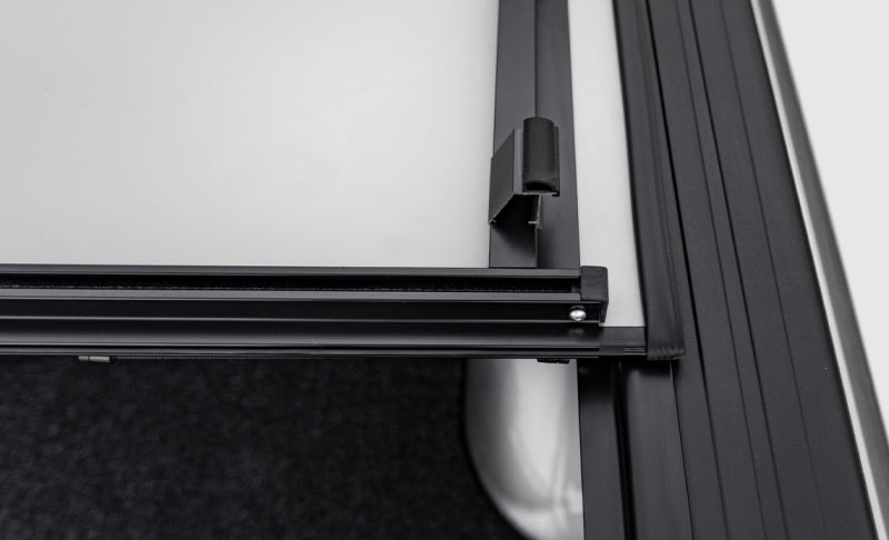 Access LOMAX Stance hard cover for Chevy/GMC 1500 full-size trucks, black urethane exterior truck bed accessory on 5ft 8in box.