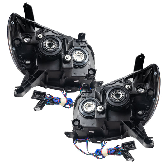 Oracle Lighting LED halo headlights for 2006-2009 Toyota 4-Runner with red accents, pre-assembled and mounted on vehicle.