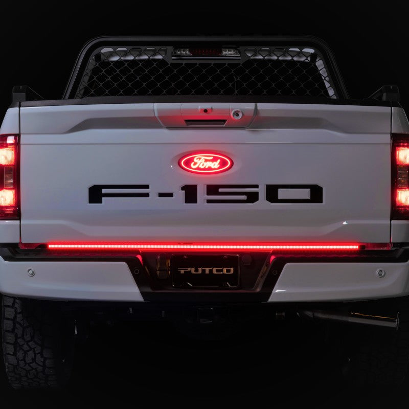 Putco 20-22 Ford Super Duty tailgate bar with LED or halogen lamps, 60-inch direct fit blade kit on truck tailgate.