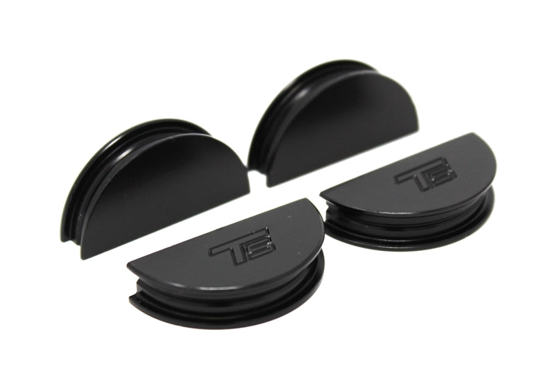 Black Torque Solution valve cover cam seals for 02-06 Subaru WRX STI LGT and FXT, shown on a valve cover gasket.