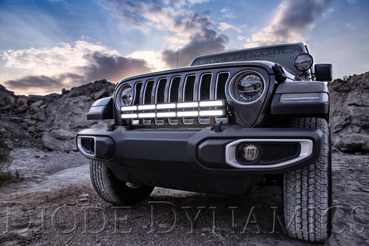 Diode Dynamics SS30 bumper bracket kit for Jeep JL Wrangler and Gladiator, white dual driving light bar mounts visible in the image.