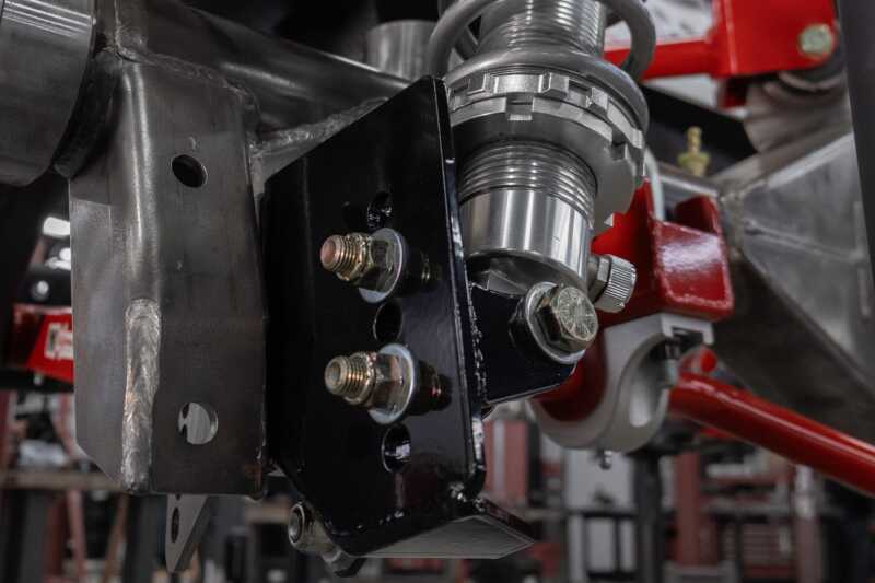 UMI Performance coilover conversion brackets kit with 250lb springs for GM A-Body, adjustable from -2in to -3in ride height.
