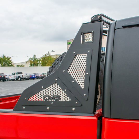 DV8 Offroad Jeep Gladiator chase rack mounted on 2019+ model, sturdy black bolt-on off-road accessory for truck bed protection.