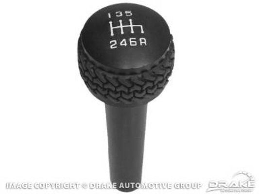 DV8 Offroad black 6-speed shift knob for Jeep TJ/JK 2005-2010, featuring a durable finish and ergonomic design.