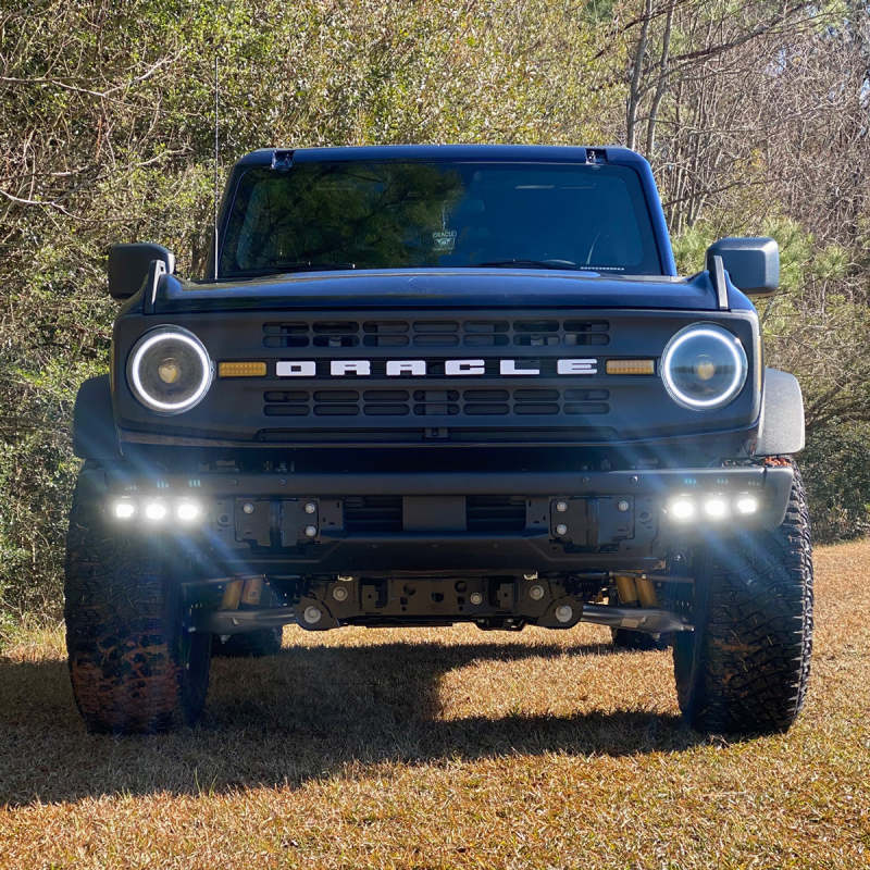 ORACLE Lighting 21-22 Ford Bronco triple LED fog light kit with white lights installed on steel bumper, off-road vehicle lighting.