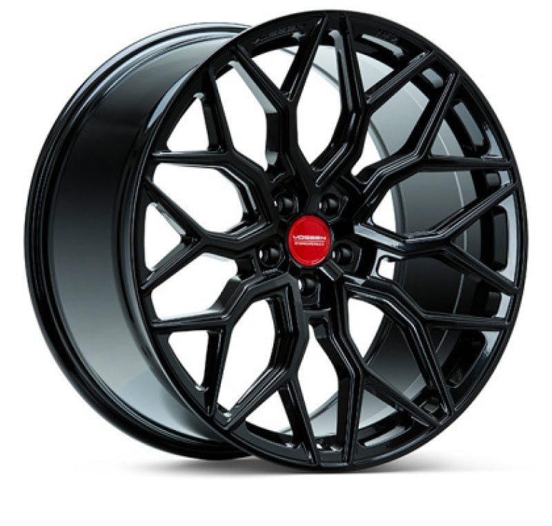 Vossen HF2 forged 22x11-inch gloss black wheels with ET22 offset and 5x120 bolt pattern, deep concave design.