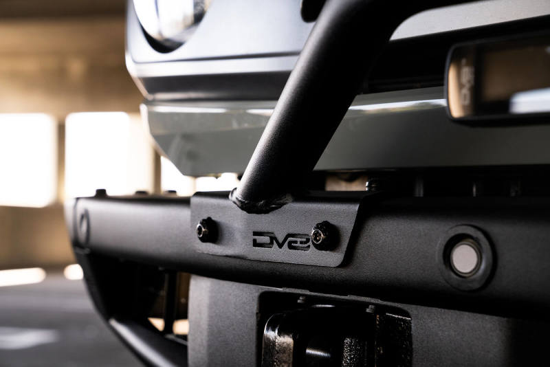 DV8 Offroad black light mounts for 2021-2022 Ford Bronco factory bumper bull bar, designed for off-road vehicle lighting.