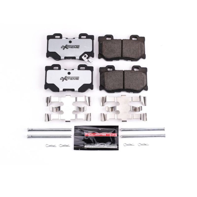 PowerStop Z26 Extreme Street rear brake pads with hardware installed on a 2010-2013 Infiniti FX50, showing the high-performance brake components.