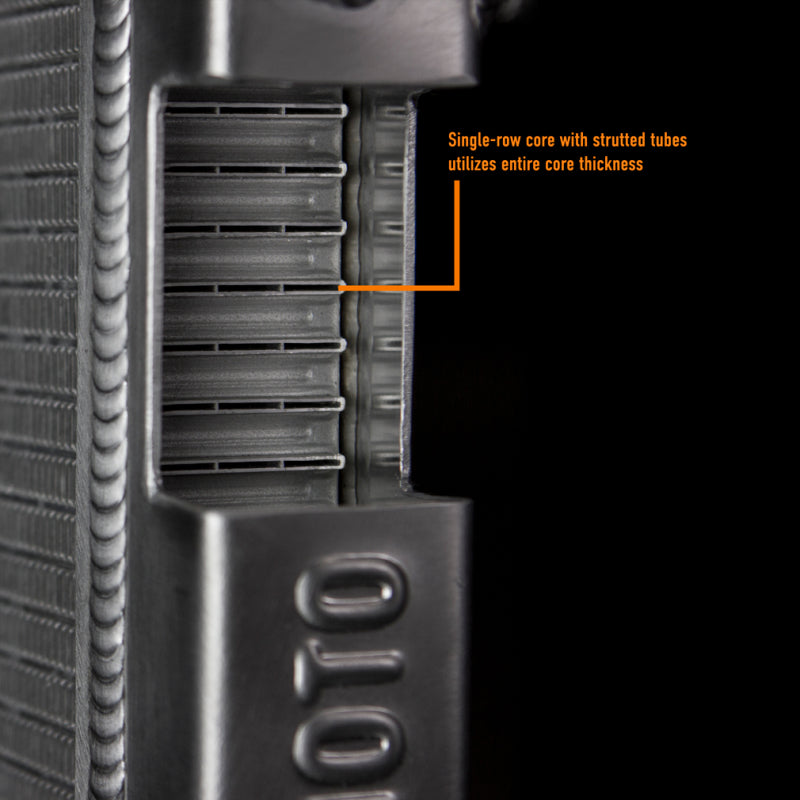 Mishimoto aluminum radiator for 2003-2009 Toyota 4-Runner and GX470 4.7L engine, with cooling fins and mounting brackets visible
