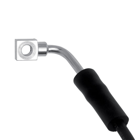 Close-up of DFC Cadillac CTS front-left brake hose from the brake line kit, showing the metal fittings and flexible rubber tubing.