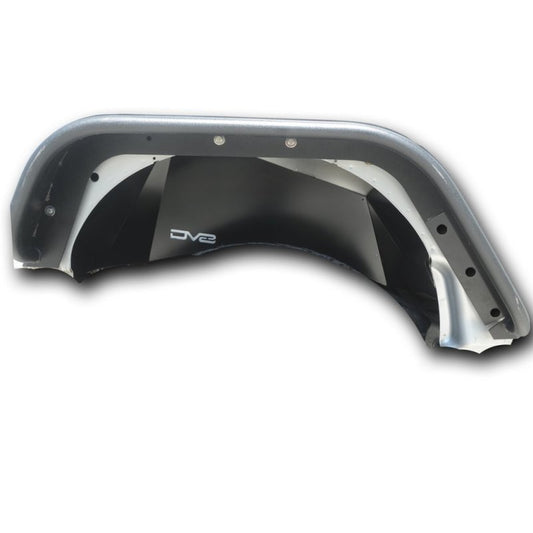 Black DV8 Offroad aluminum rear fender liner for Jeep Wrangler JK 2007-2018, provides durable wheel well protection.