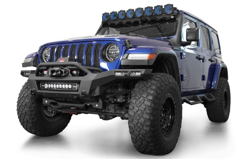 Addictive Desert Designs steel rear bumper for Jeep Wrangler JL and Gladiator JT with integrated winch mount and rugged design.