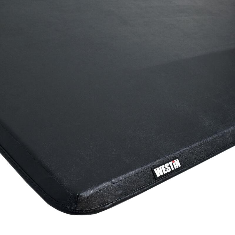 Westin soft tri-fold tonneau cover for 2024+ Toyota Tacoma 74-inch bed, made of durable fabric with secure folding panels.