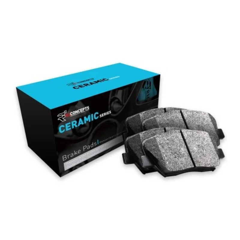 R1 Concepts BMW X5 front ceramic brake pads, OE type, showcasing the high-quality brake pad set with metal backing and friction surface.