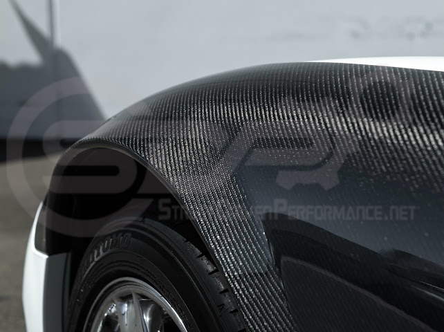 Factory style carbon fiber front and rear widebody fenders for 1997-2004 Chevrolet Corvette C5 hatchback by Street Driven Performance.