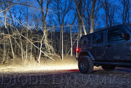 Diode Dynamics Jeep JL Wrangler SS30 rear hardtop bracket kit with white flood light mount installed on vehicle.