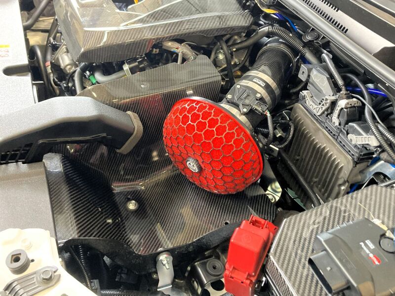 HKS cold air intake full kit for GZEA14H, includes air filter, tubing, and mounting components for improved engine airflow.