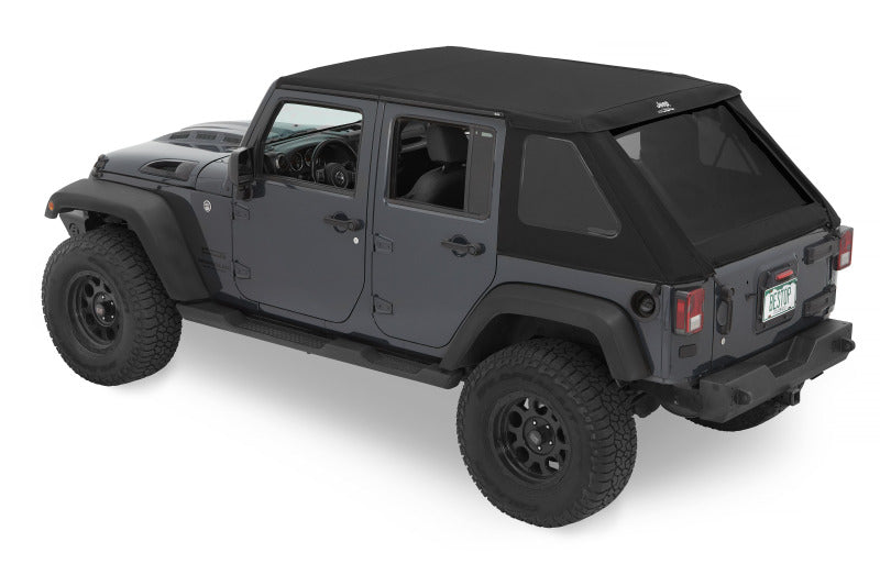 Bestop Jeep Trektop soft top for 2007-2018 Jeep Wrangler JK 4-door in Black Diamond fabric, shown installed on vehicle.