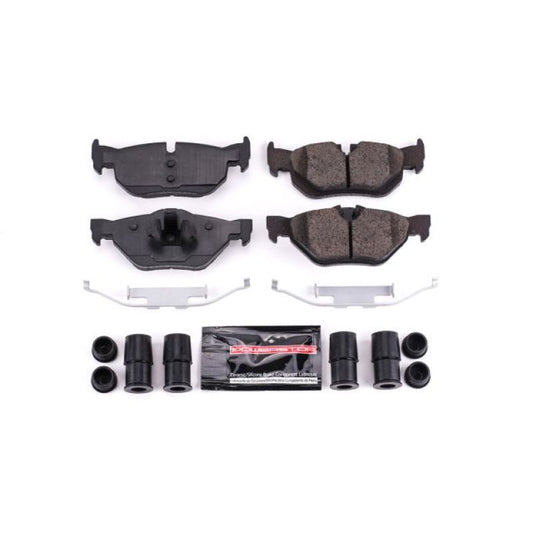 PowerStop Z23 Evolution Sport rear brake pads for BMW 128i, showing the black brake pads with hardware included.