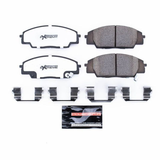 PowerStop Z26 Extreme Street brake pads with hardware installed in the front of a 2007-2010 Acura CSX, performance brake component.