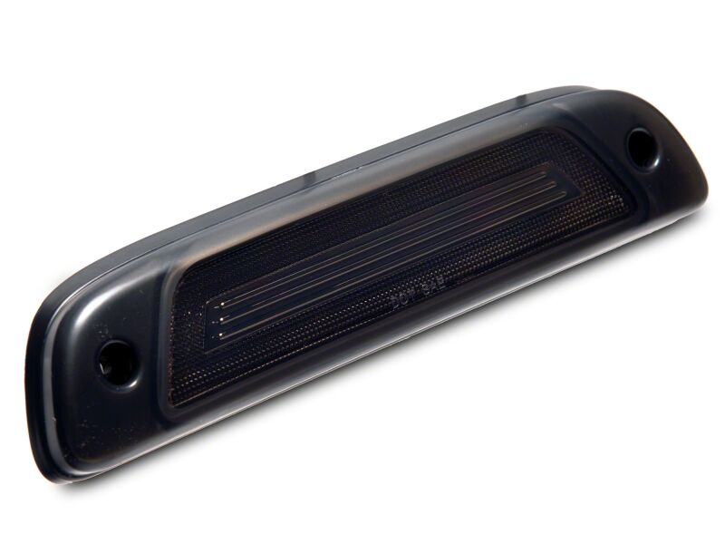 Raxiom smoked LED third brake light for 2005-2015 Toyota Tacoma, axial series, mounted on vehicle rear window.