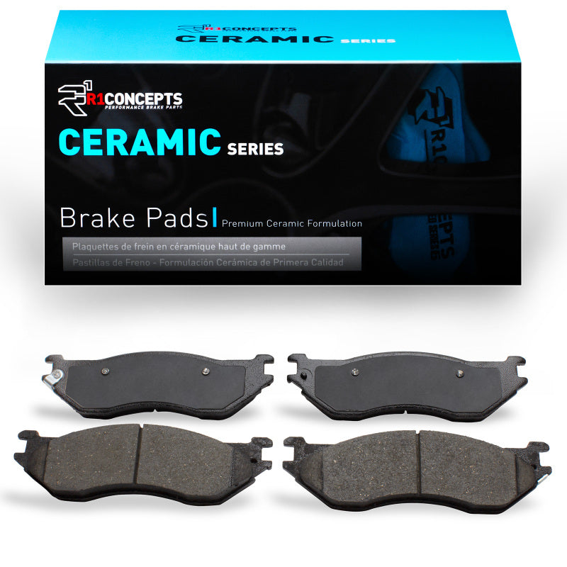 R1 Concepts Dodge Durango front ceramic brake pads, OE type, showing the brake pad set with metal backing and friction surface.