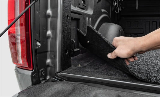 Access truck bed liner for Ram 1500 and Ram 1500 Classic 5ft 7in bed, drop-in carpet bed mat for protection and durability.