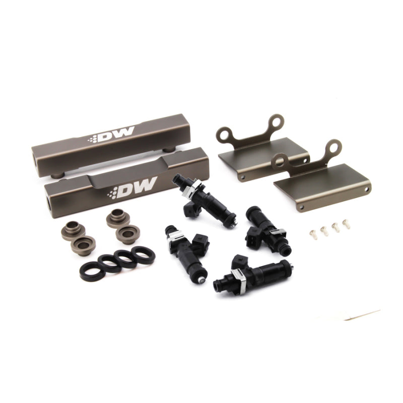 DeatschWerks fuel rail conversion kit with 1200cc injectors for 04-06 Subaru STI/LGT, showing side feed to top feed setup.