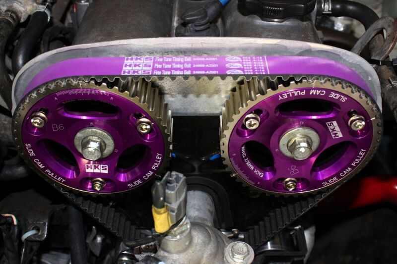 HKS slide cam pulley for B6/BP engines, lightweight cam gears with precision machining for performance enhancement.