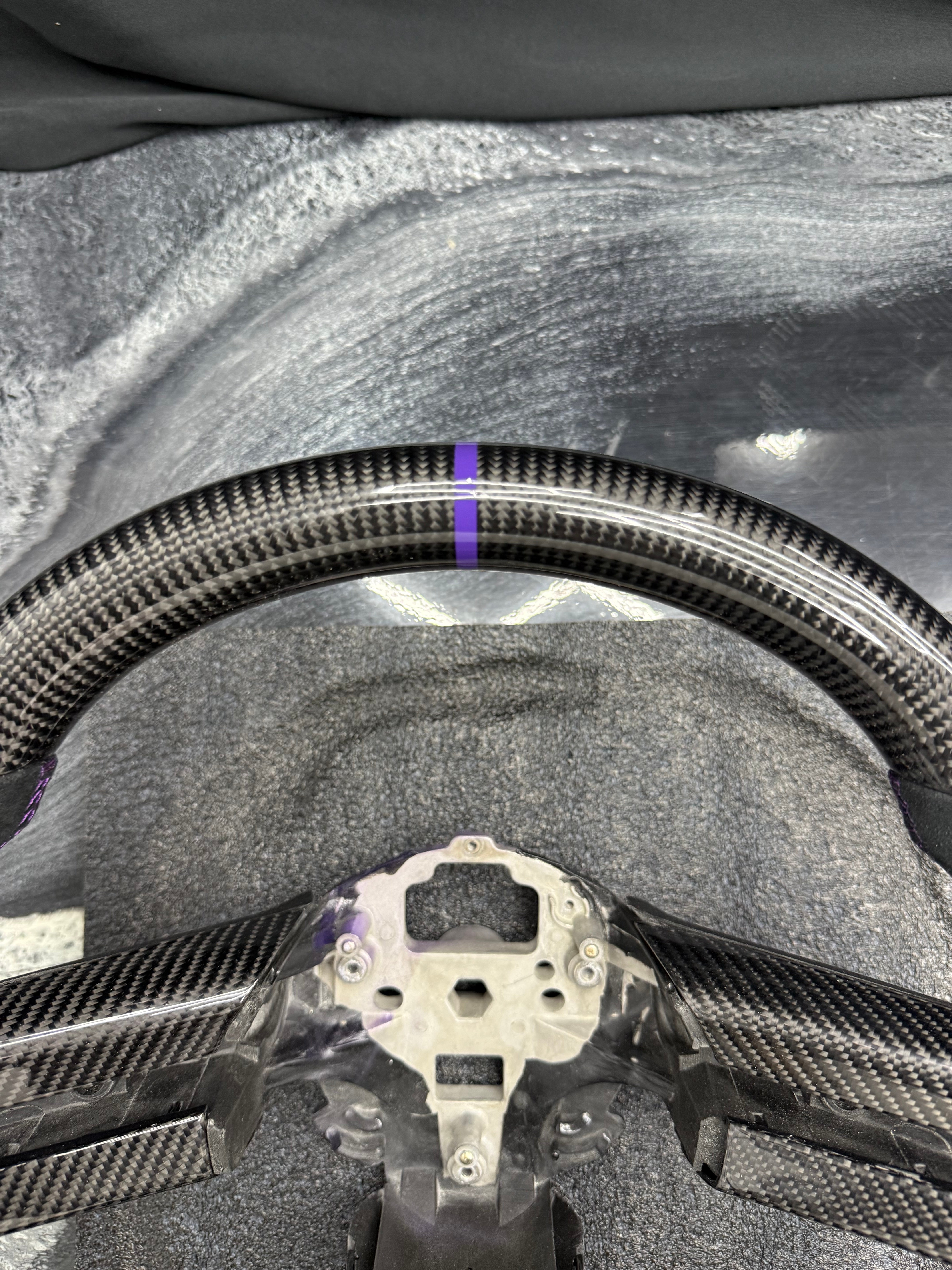 2005 - 2009 Ford Mustang S197
-Custom Carbon Fiber Steering Wheel with Alcantara Suede Hand Grips (Purple Stripe & Stitching) (IN STOCK READY TO SHIP)