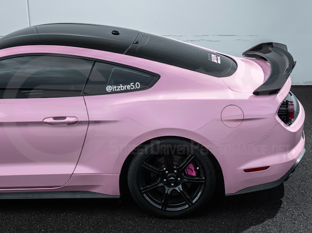Dark Horse style carbon fiber rear wickerbill spoiler wing on a 2015-2023 Ford Mustang, showcasing sleek aerodynamic design.